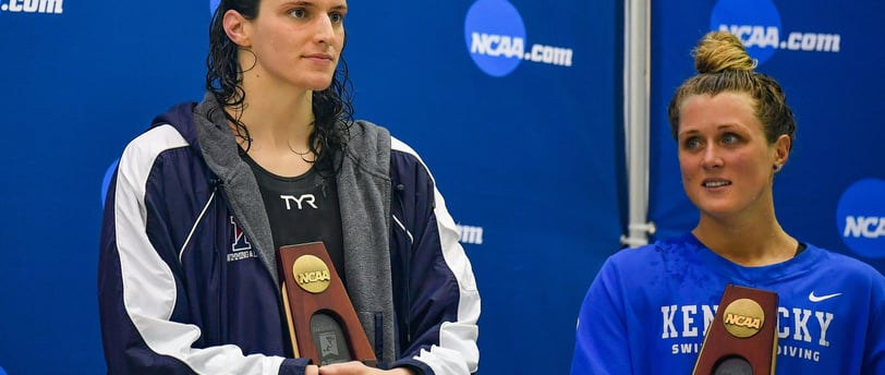 a woman holding a trophy and a trophy