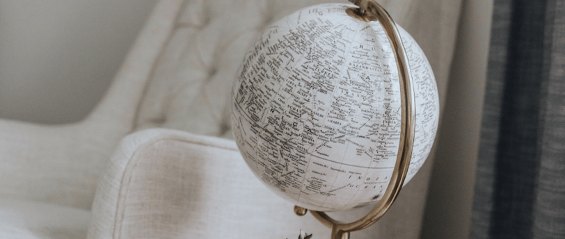 a globe globe with a plant in a living room