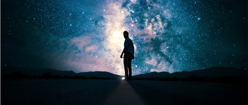 A guy walking at night
