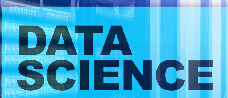 a large blue and white sign that says data science with a computer server as the background 