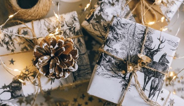 gift boxes wih white paper and lights