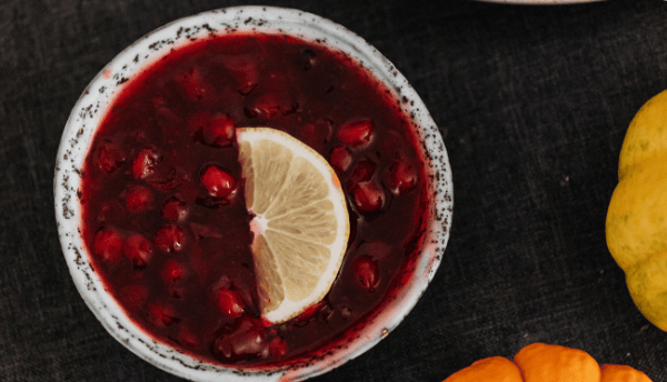 cranberry sauce with some fruits on the table
