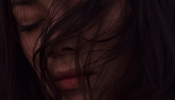 a girl face cover with hairs
