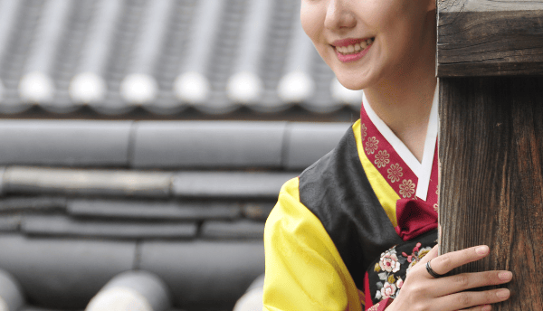 girl standing and smiling