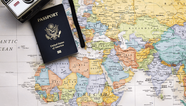 a map and camera on it with passport