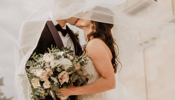 bride and groom kissing