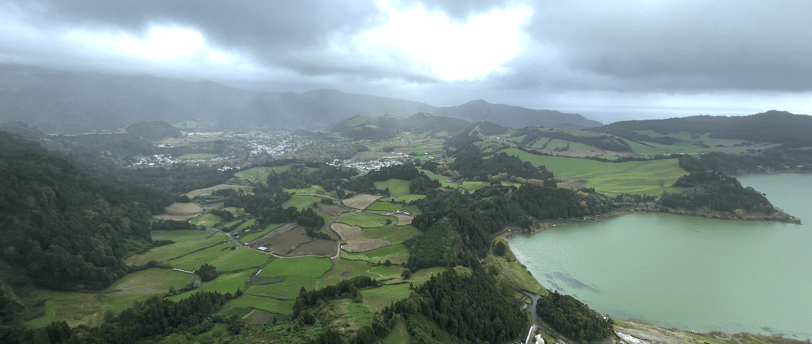 a view of a lake and mountains in the distance