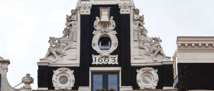 Gable stone of old house in Amsterdam