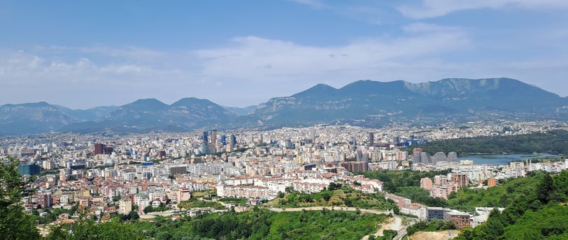 a view of a city from a hill top