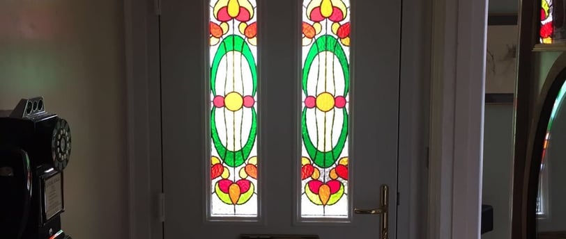 a front door with bespoke glass for a new front door