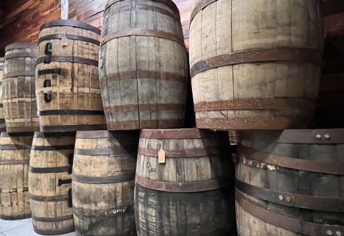 a bunch of barrels of wine barrels stacked on top of each other