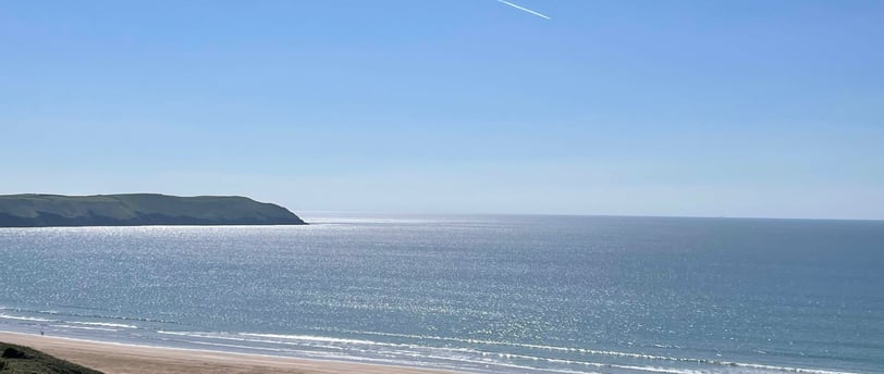 Woolacombe Beach, the sun sparkling on the sea