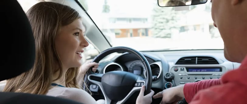 a man and woman in a car