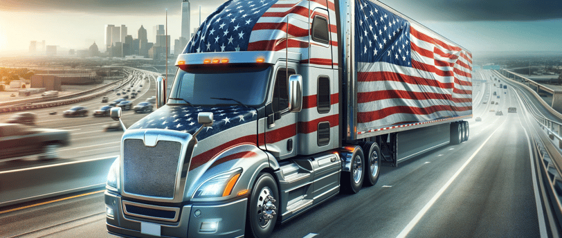 a truck with a large american flag on it