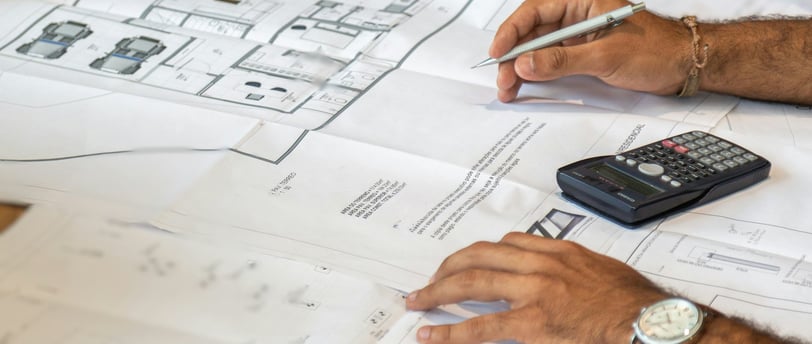 house designer calculating home quantities