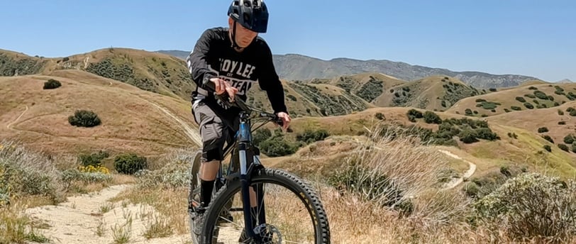 a mtb rider thinking about the jump they are about to hit
