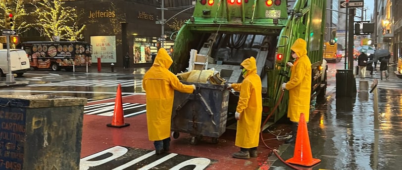 Andrew Horan on a NYC demolition site reviewing a live public dashboard that shows environmental and