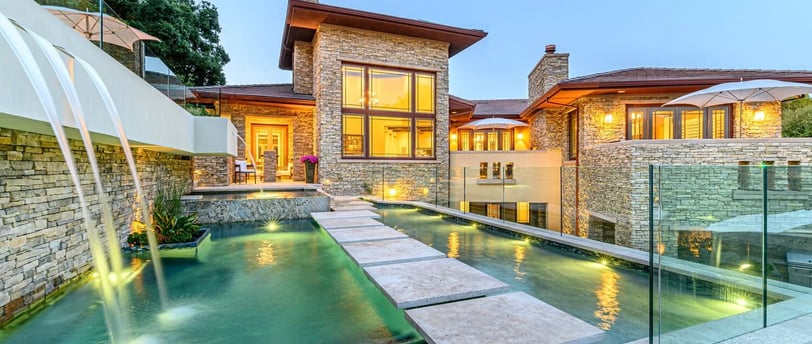 Custom infinity edge swimming pool designed by Los Altos pool builders