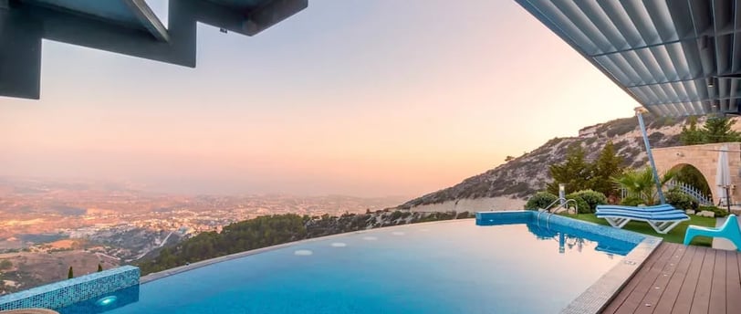 Luxury infinity pool in San Mateo backyard with scenic views, built by custom pool contractors