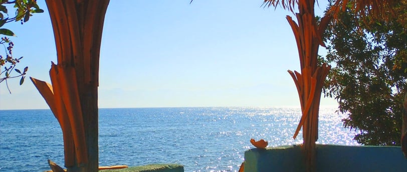 Watching the sea from our popular bungalow with shared bathroom first line
