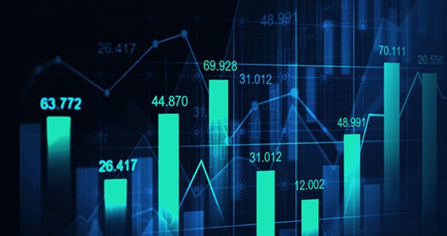 a business man is shown in front of a chart of graphs