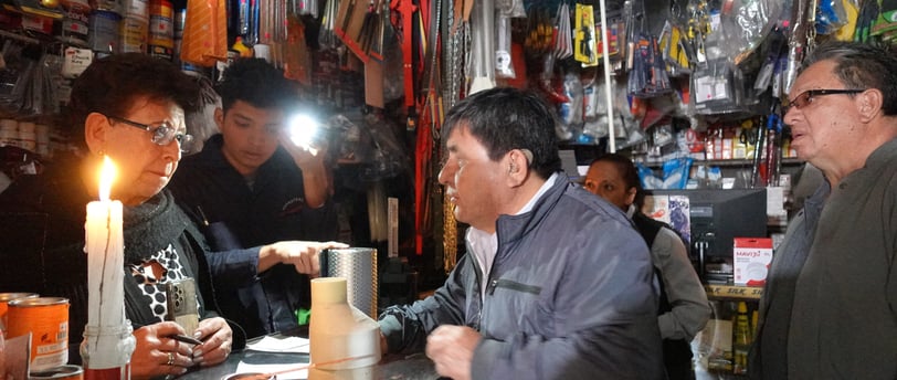 a man standing in front of a counter top
