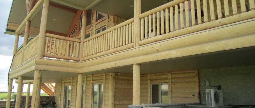 log home stain fading, peeling stain log home, log home restoration Alberta