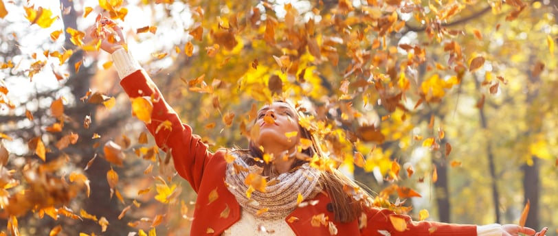 Throwing leaves in the air 