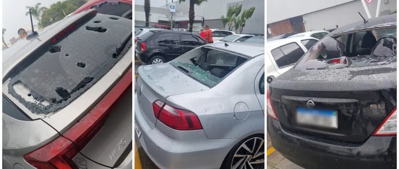 carros com vidros perfurados por pedras de granizo