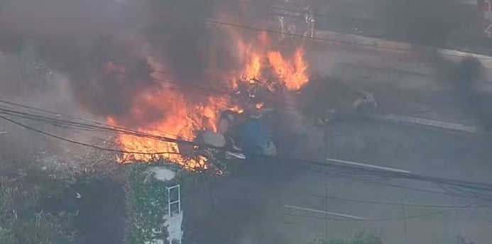 a fire that is burning in the middle of a street