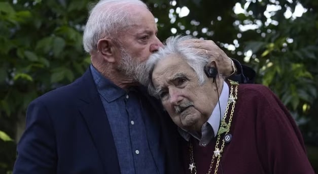 a man and woman standing next to each other