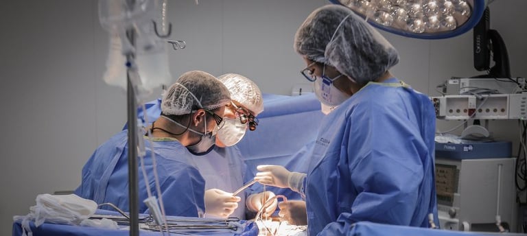 a group of surgeons performing surgery in a hospital