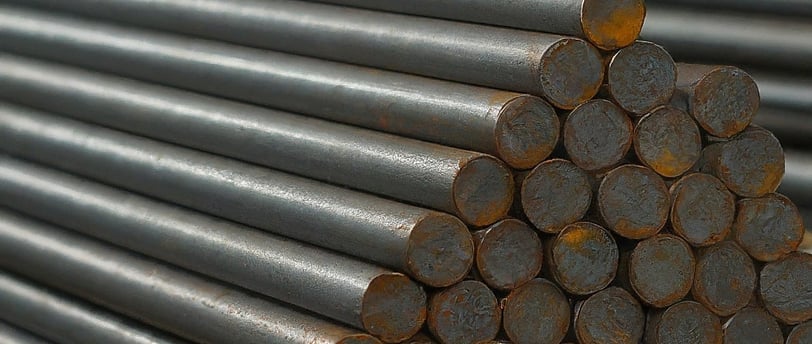 a pile of metal bars with a pile of metal bars