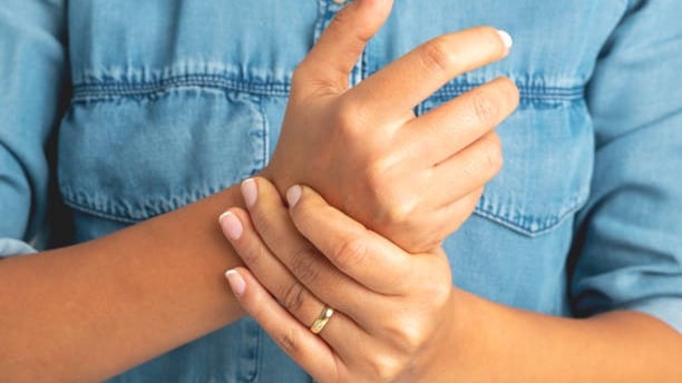 a woman with a ring on her finger