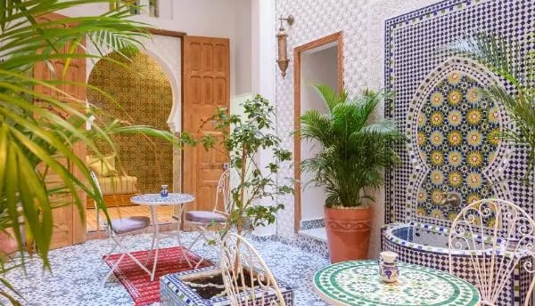 morocco a room with a table and chairs and a table