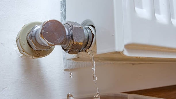 leaking radiator valve and pipework
