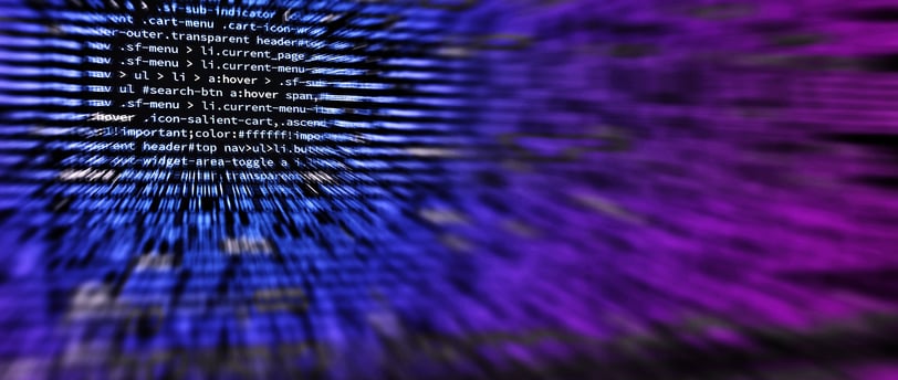 a distorted image of screen showing lines of code