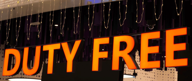 a sign that says duty free on a storefront