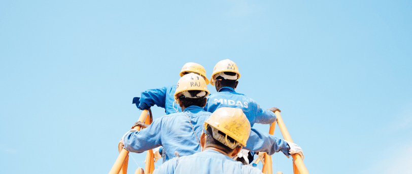 workers with blue uniforms