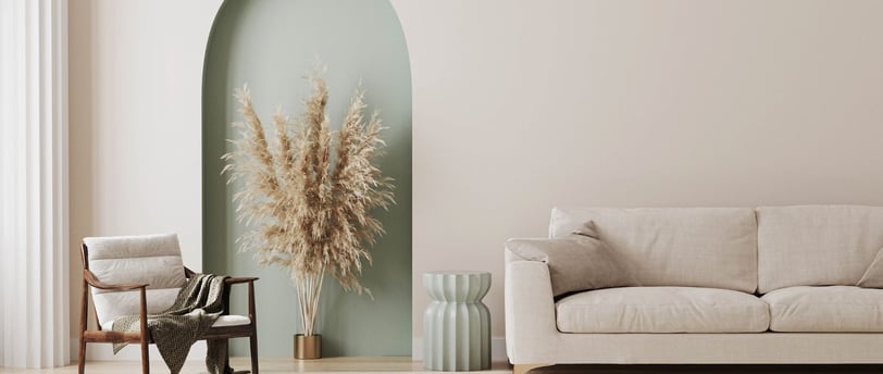 a living room with a couch and a chair