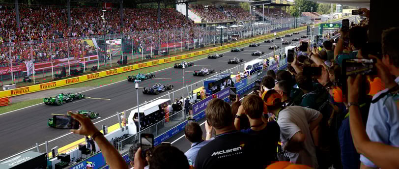 a group of people watching a race