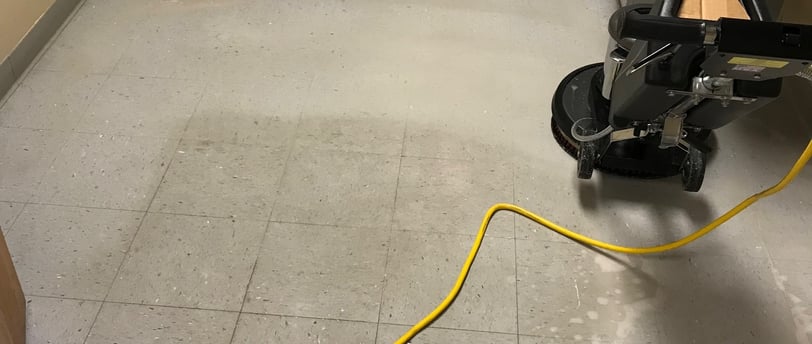 "Tile Stripping in a medical office in Ormond Beach, FL by TEC Floor Services."
