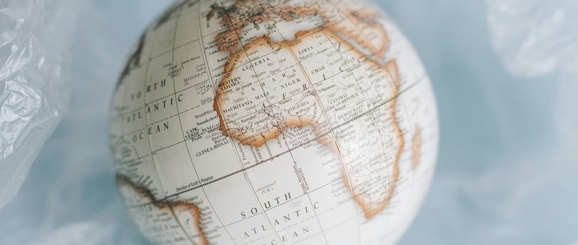 a globe in plastic wrap