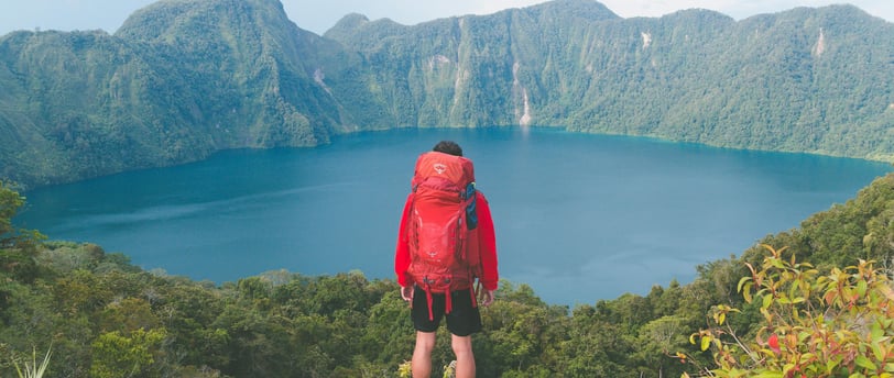 a man with a red backpack '