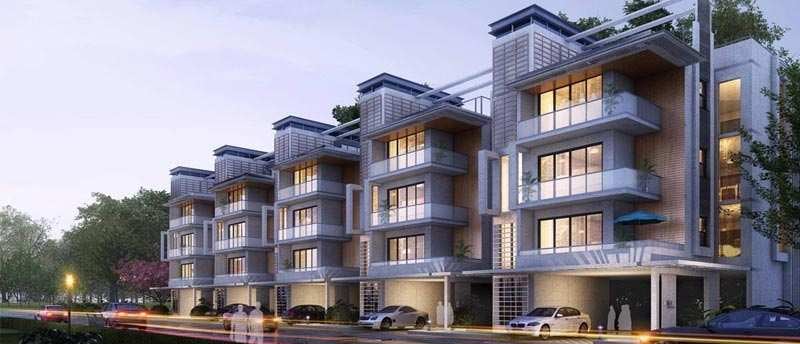 a building with a lot of windows and a lot of cars