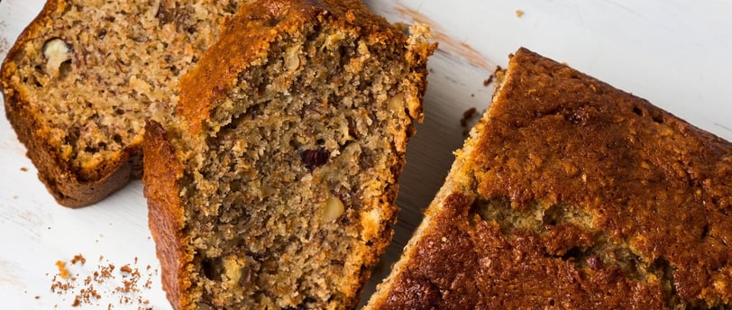 Slices of brown butter banana bread with walnuts