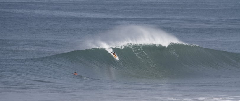perfect wave been ridden by a bodyboarder