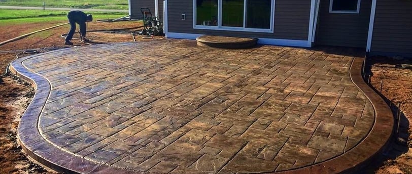 a patio with a brick patio with a brick patio