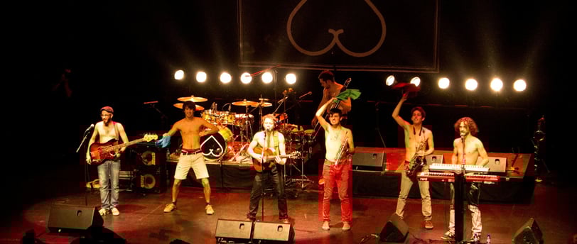 a group of people standing on a stage
