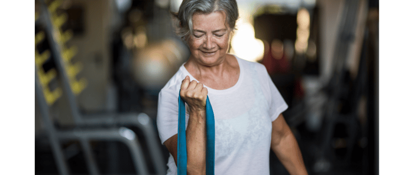 post menopausal women exercising with a band